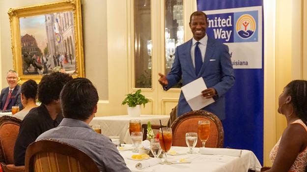 Marcus Brown speaks at a luncheon.